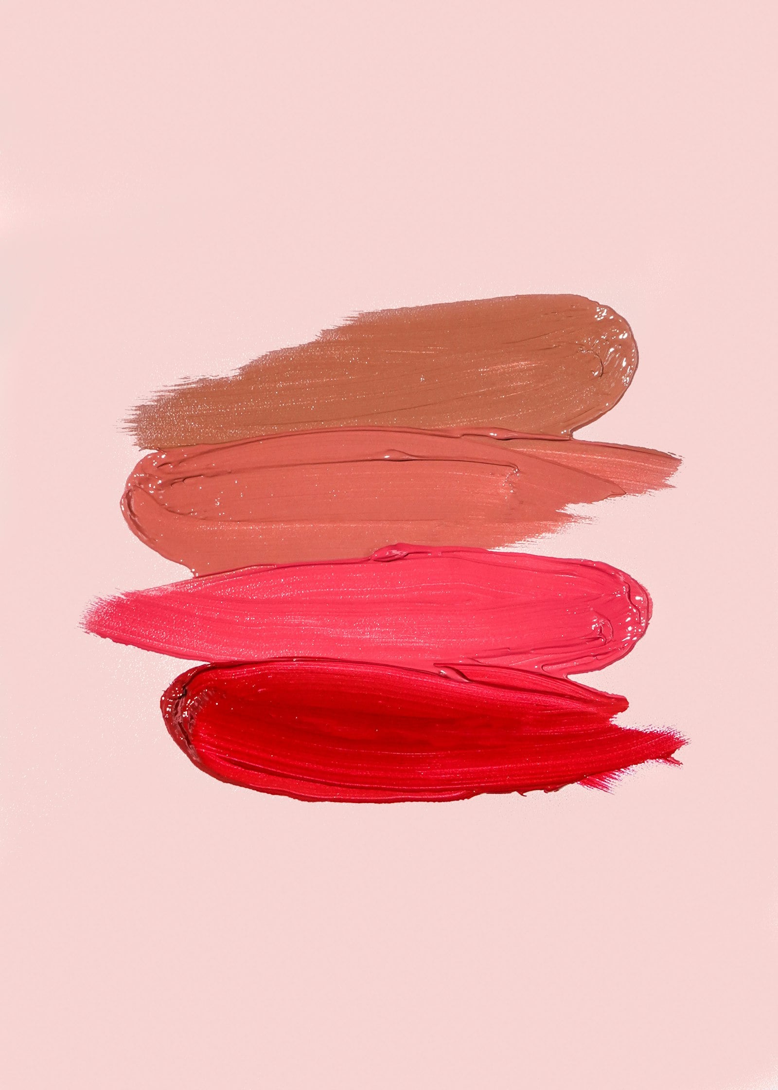 Four lip color swatches from nude to red (photo: Ashley Piszek / Unsplash)